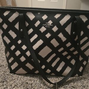 Coach purse, black and white. Used but in good condition.
